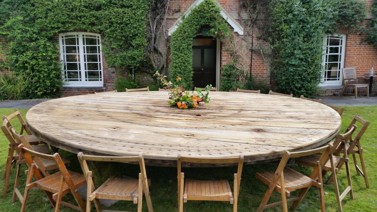 24 people can sit around this awesome table outside